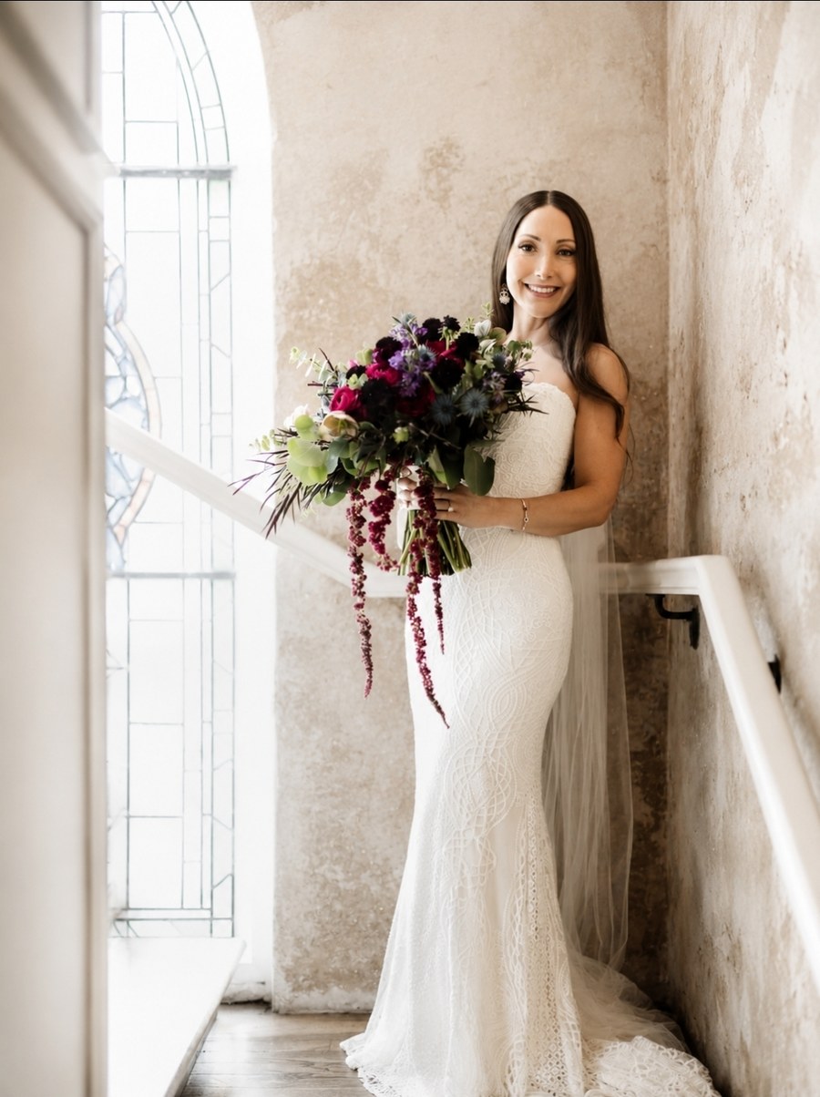 Luxury Bride in a lace gown with a jewel-tone bouquet, Hair and Makeup by Cedrian Greve Artistry